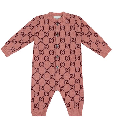 baby gucci onesie.